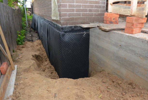 SJ Waterproofing Pros technician performing targeted Wet Basement Repair assessment in Short Hills, NJ